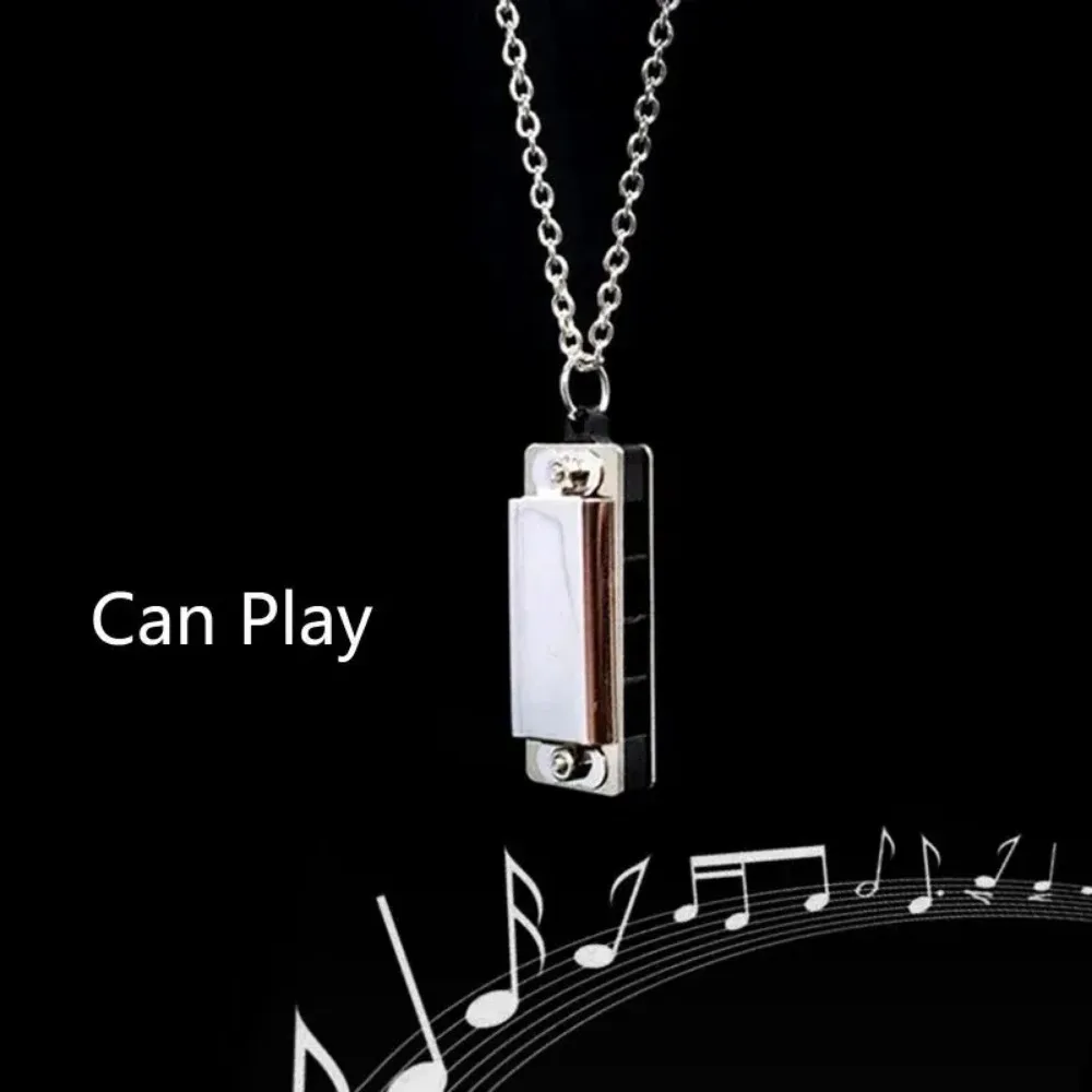 Mini mondharmonica ketting man - Musical Instrument You Blow Into recensie en prijs