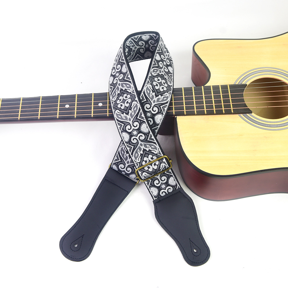 Gitaarband met geborduurde pri - Musical Instrument Art recensie en prijs