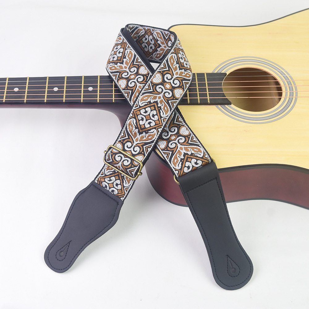 Gitaarband met geborduurde pri - Musical Instrument Art recensie en prijs