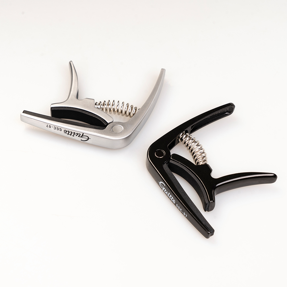 Guitto GGC-07 Ukelele Capo Sne - Musical Instrument Art recensie en prijs